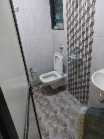 Bathroom in 1 BHK Apartment at Om Sai Tower, Dahisar West – for Rent