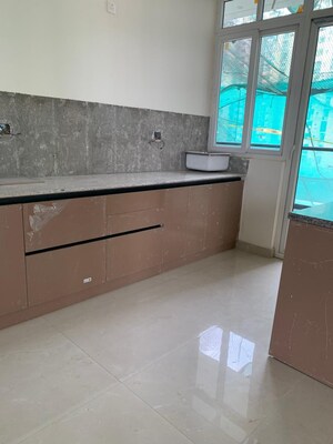 Kitchen in 3 BHK Apartment at Shri Radha Aqua Garden, Sector 16b Greater Noida – for Sale