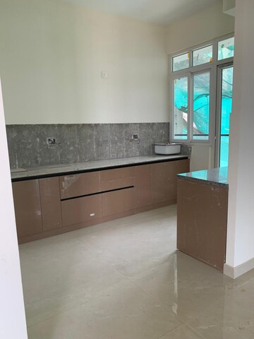 Kitchen in 3 BHK Apartment at Shri Radha Aqua Garden, Sector 16b Greater Noida – for Sale