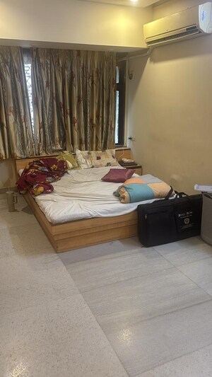 Living Room in 2 BHK Apartment at Clifton Apartment, Andheri West – for Rent