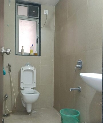 Bathroom in 2 BHK Apartment at Runwal Eirene, Balkum Pada – for Rent