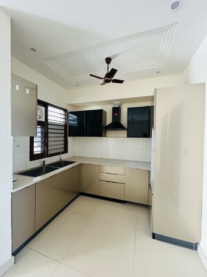 Kitchen in 2 BHK Apartment at Sunny Enclave – for Sale