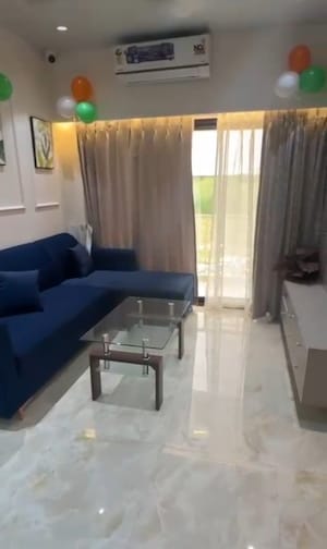Living Room in 1 BHK Apartment at Gladiolus Crown, Vasai East – for Sale