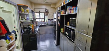 Kitchen in 2.5 BHK Apartment at Godrej Regency Park, Manpada – for Sale
