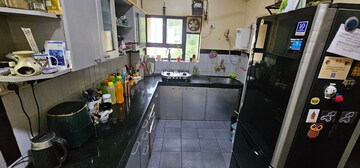 Kitchen in 2.5 BHK Apartment at Godrej Regency Park, Manpada – for Sale