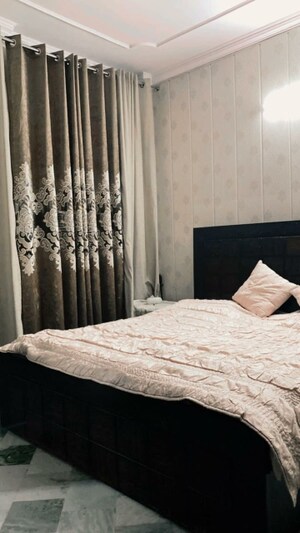 Bedroom in 1.5 BHK Builder Floor at Ramesh Nagar – for Rent