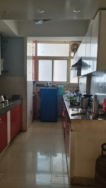 Kitchen in 2 BHK Apartment at Exotica Dreamville, Sector 16c Greater Noida – for Rent