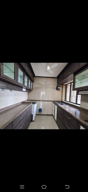 Kitchen in 2 BHK Apartment at Runwal Garden City, Balkum Pada – for Rent