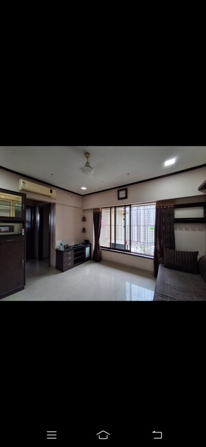 Living Room in 2 BHK Apartment at Runwal Garden City, Balkum Pada – for Rent