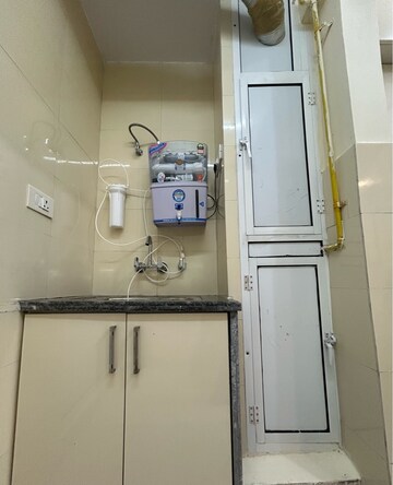 Kitchen in 2 BHK Apartment at La Residentia, Tech Zone 4 Greater Noida – for Rent