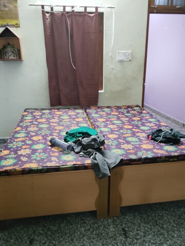 Bedroom in 1.5 BHK Builder Floor at Vikas Nagar – for Rent