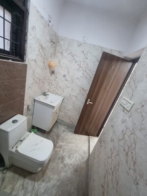 Bathroom in 4 BHK Builder Floor at Green Fields Colony – for Rent