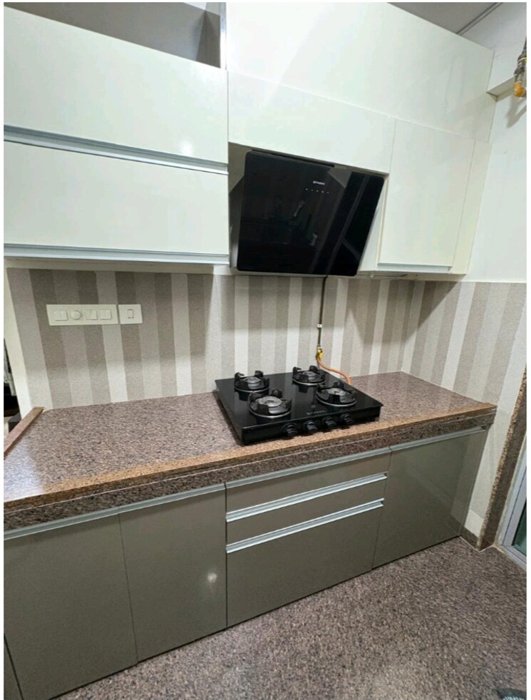 Kitchen, raymond-ten-x-habitat 1 Bedroom 418 Sq.Ft. Apartment In Pokhran Road No Two Thane 9214497