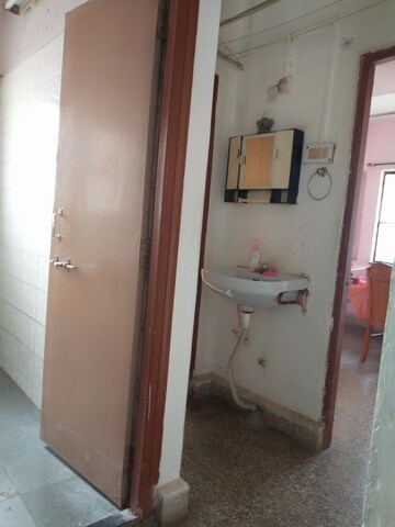 Bathroom in 2 BHK Apartment at Sudhir Aakash, Karve Road – for Rent