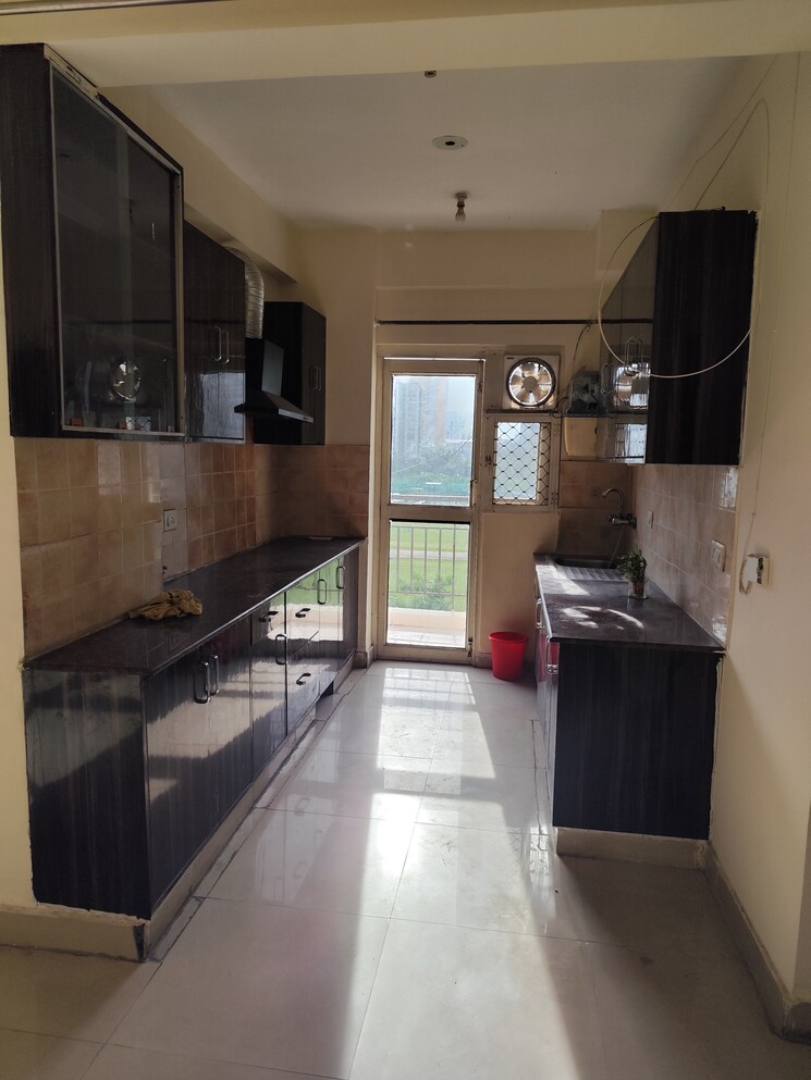Kitchen, aims-golf-city 2 Bedroom 950 Sq.Ft. Apartment In Sector 75 Noida 9214586