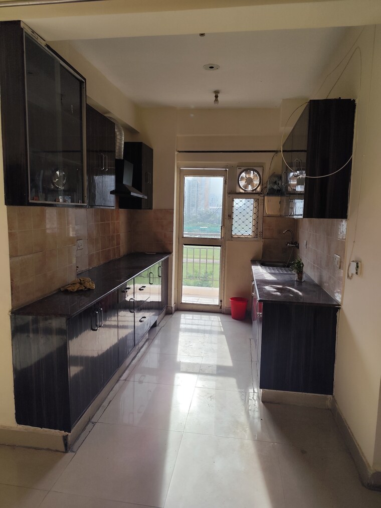 Kitchen, aims-golf-city 2 Bedroom 950 Sq.Ft. Apartment In Sector 75 Noida 9214586