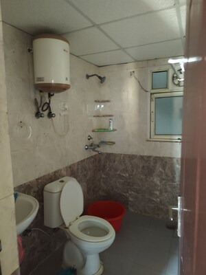 Bathroom in 3 BHK Apartment at Aims Golf City, Sector 75 – for Rent