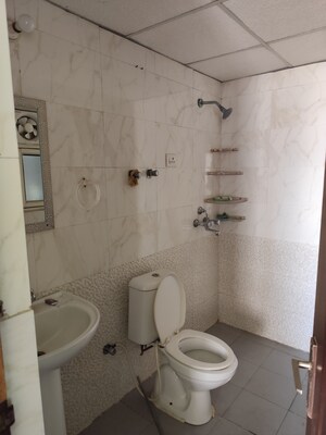 Bathroom in 3 BHK Apartment at Aims Golf City, Sector 75 – for Rent