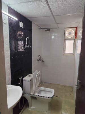 Bathroom in 3.5 BHK Apartment at Aims Golf City, Sector 75 – for Rent