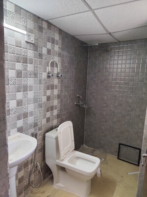 Bathroom in 3.5 BHK Apartment at Aims Golf City, Sector 75 – for Rent