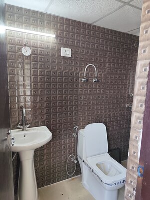 Bathroom in 3.5 BHK Apartment at Aims Golf City, Sector 75 – for Rent