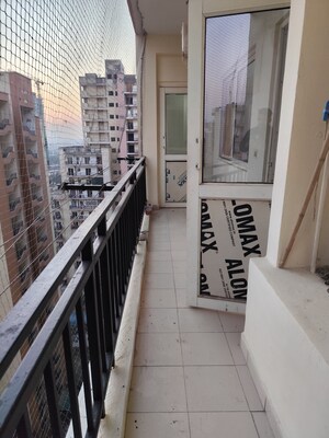 Balcony in 4 BHK Apartment at Aims Golf City, Sector 75 – for Rent