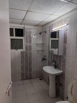 Bathroom in 4 BHK Apartment at Aims Golf City, Sector 75 – for Rent