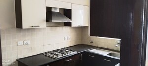 Kitchen in 3 BHK Builder Floor at Ansal API Esencia, Sector 67 – for Sale