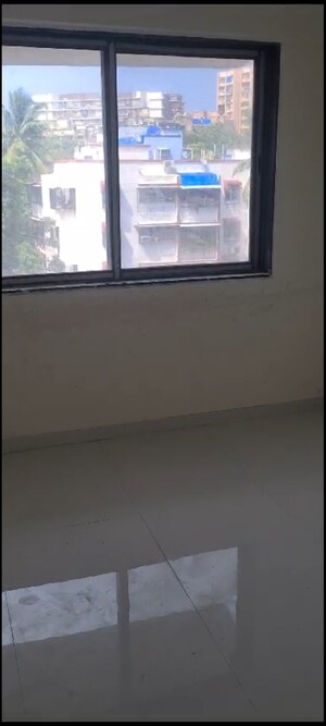 Room in 2 BHK Apartment at Sahar CHS, Andheri East – for Sale