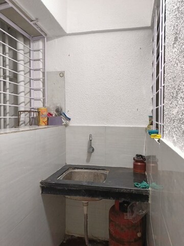 Kitchen in 2 BHK Apartment at Mohannagar CHS, Baner – for Rent