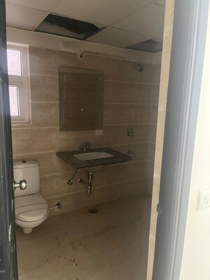 Bathroom in 3 BHK Apartment at Ansal Crown Heights, Sector 80 – for Rent