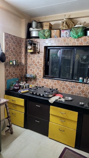 Kitchen in 2 BHK Apartment at Anand CHS, Sion East – for Sale