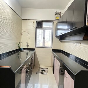 Kitchen in 2 BHK Apartment at Cosmos Classique, Brahmand – for Rent