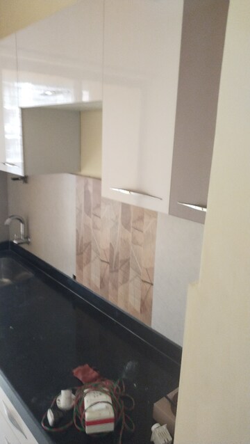 Kitchen in 1 BHK Apartment at Neelkanth Oasis, Kharghar – for Rent