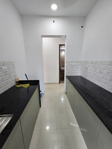 Kitchen in 2 BHK Apartment at Kalpataru Immensa, Kolshet Road – for Rent