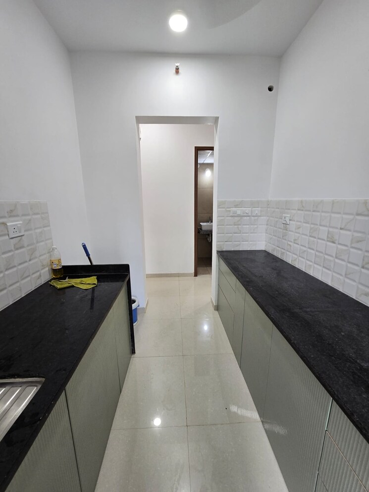 Kitchen, kalpataru-immensa 2 Bedroom 771 Sq.Ft. Apartment In Kolshet Road Thane 9215364