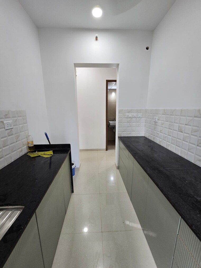 Kitchen, kalpataru-immensa 2 Bedroom 771 Sq.Ft. Apartment In Kolshet Road Thane 9215364