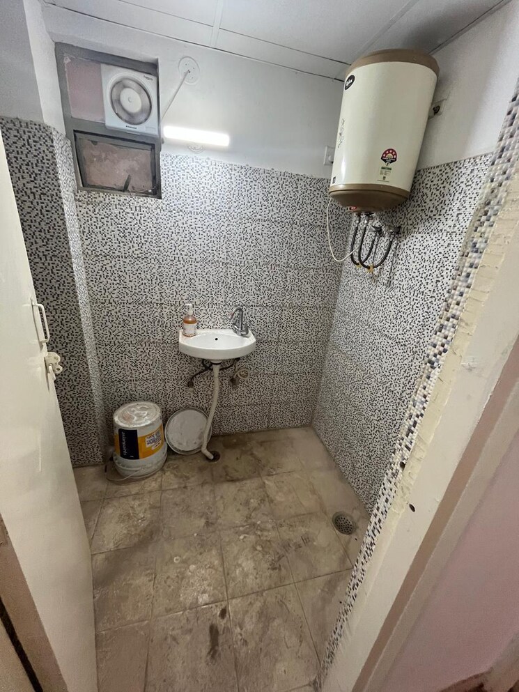 Bathroom, breez-global-hill-view 2 Bedroom 585 Sq.Ft. Apartment In Sohna Sector 11 Gurgaon 9215433