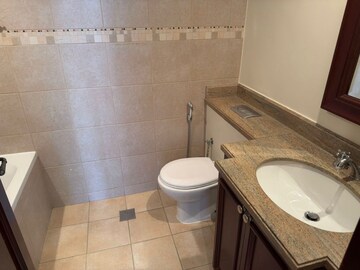 Bathroom in 4 BHK Apartment at Azumi CHS, Khar West – for Sale