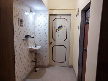 Bathroom in 1 BHK Apartment at Rutu Estate, Brahmand – for Rent