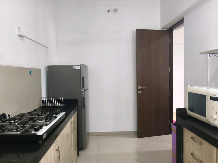Kitchen, lodha-belmondo 3 Bedroom 1702 Sq.Ft. Apartment In Gahunje Pune 9215735