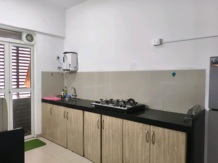 Kitchen, lodha-belmondo 3 Bedroom 1702 Sq.Ft. Apartment In Gahunje Pune 9215735