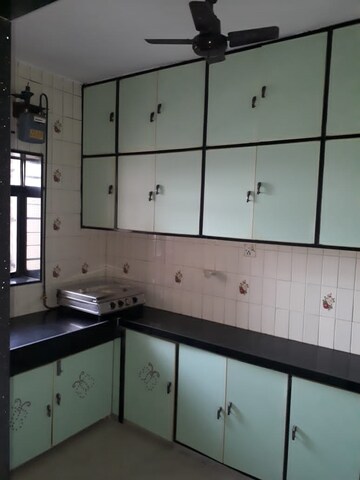 Kitchen in 4 BHK Apartment at Acme Anand Dham, Andheri East – for Rent