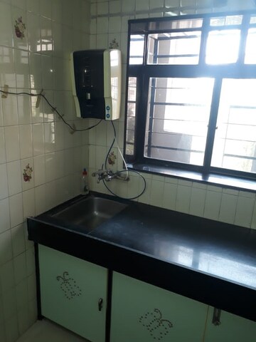 Kitchen in 4 BHK Apartment at Acme Anand Dham, Andheri East – for Rent