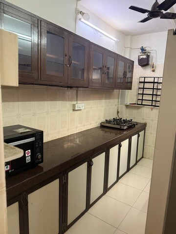 Kitchen in 1 BHK Apartment at Lokhandwala Complex, Andheri West – for Rent