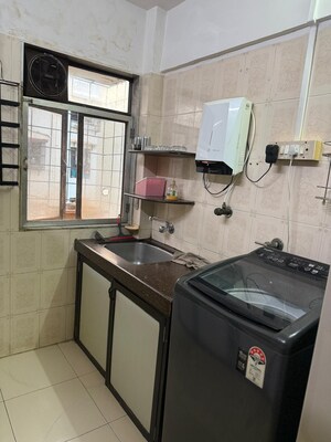Kitchen in 1 BHK Apartment at Lokhandwala Complex, Andheri West – for Rent