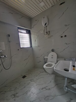 Bathroom in 2 BHK Apartment at Raheja Garden Estate, Midc Colony – for Rent