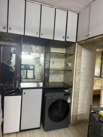 Kitchen in 2 BHK Apartment at Rajmatha CHS, Andheri West – for Rent