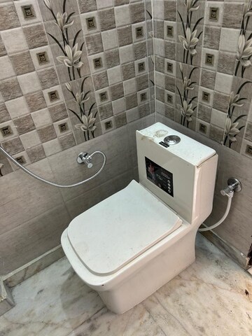 Bathroom in 3 BHK Apartment at Arun Vihar Sector 37, Sector 37 – for Rent
