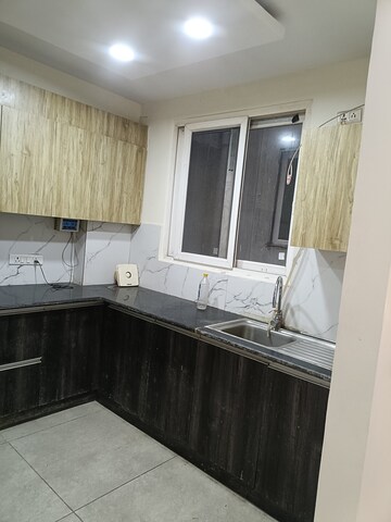 Kitchen in 3 BHK Builder Floor at Ansal API Esencia, Sector 67 – for Rent